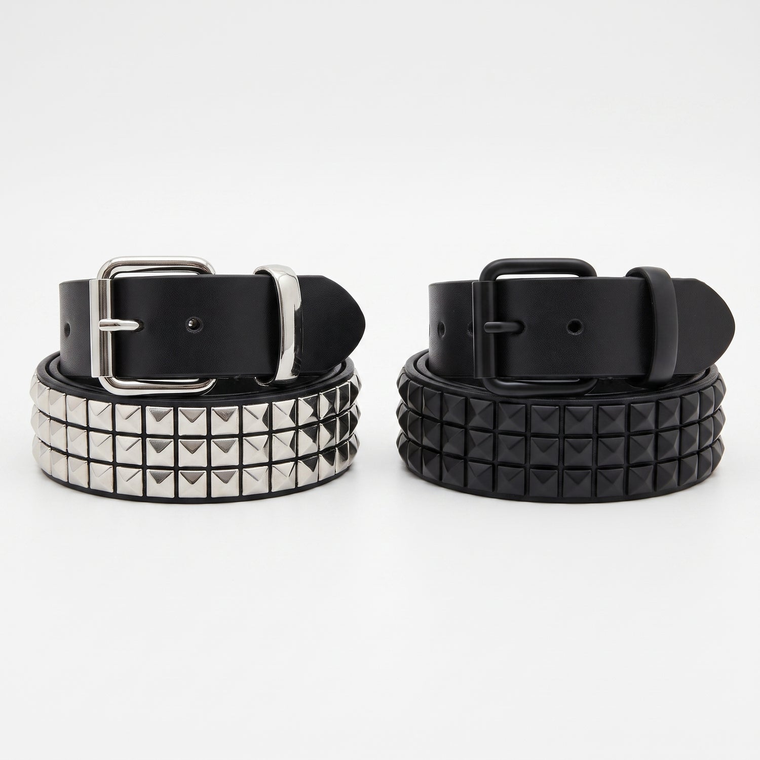 Silver stud and black stud versions of the pyramid studded belt side by side