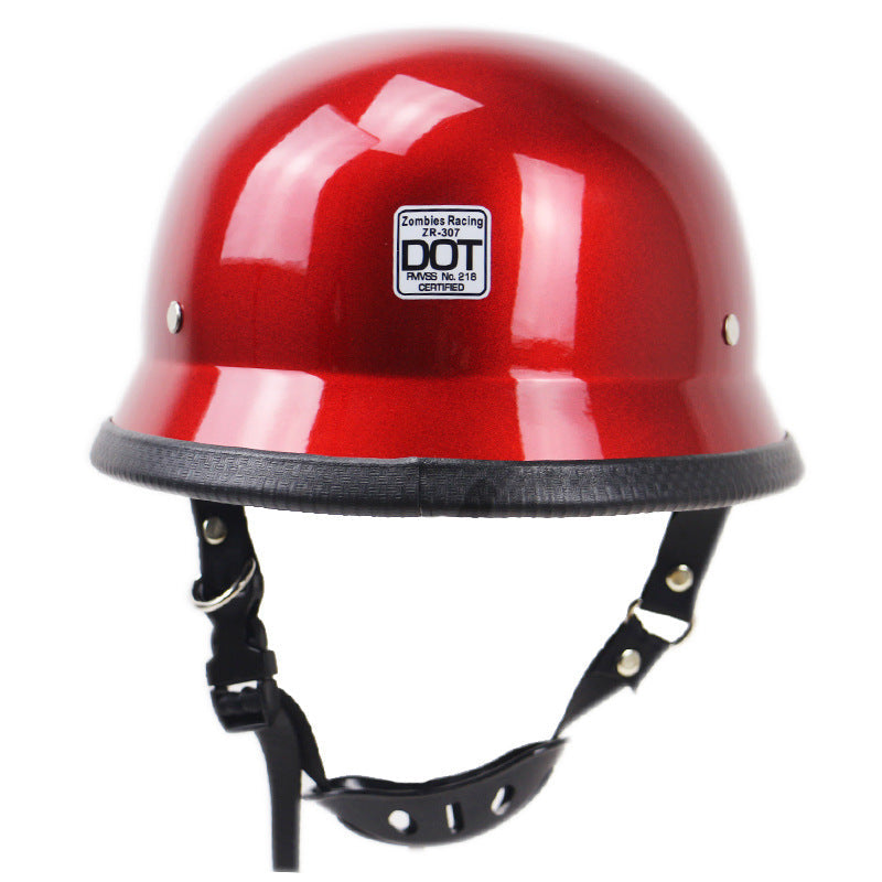 Trim and strap detail on the red German helmet