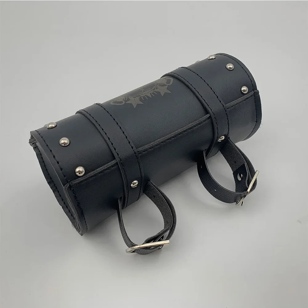 Buckle straps and stud detail on the leather tool pouch