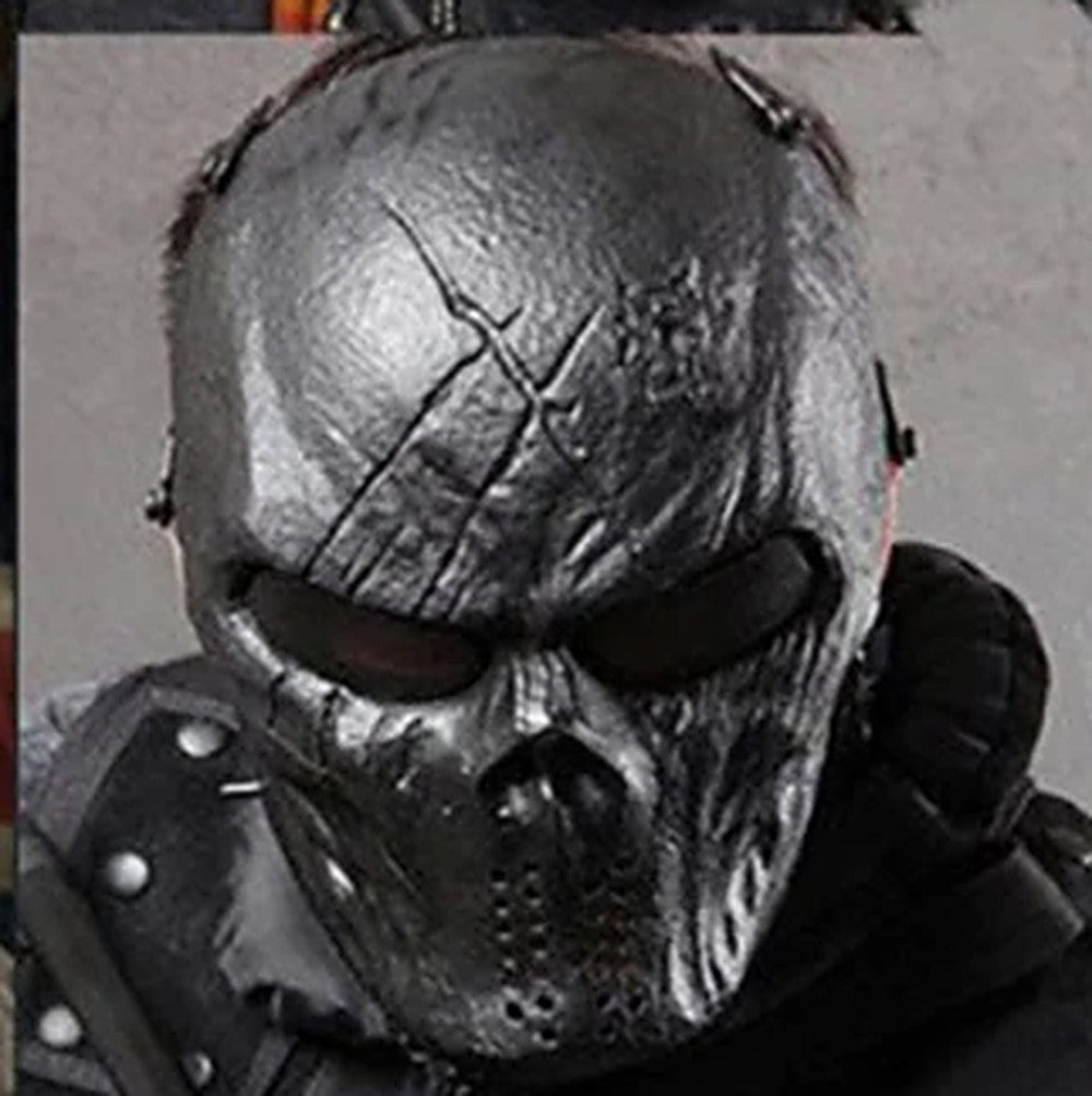 Gunmetal skull mask worn with tactical gear