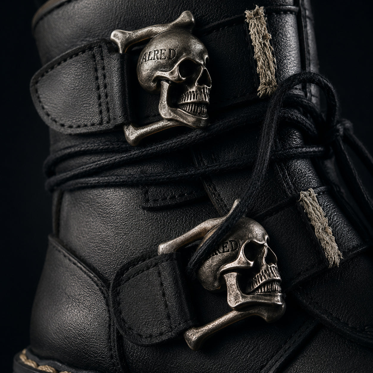 Iron Reign dual skull buckle macro detail