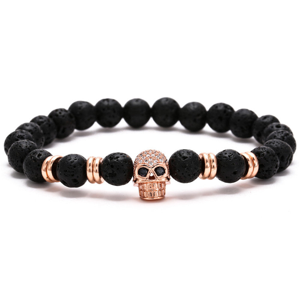 A black and rose gold Skull Bracelet for Bikers, 8 in.