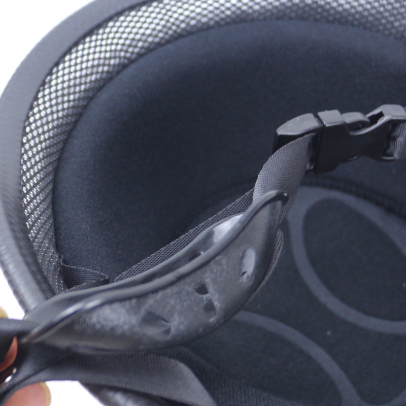 A durable Glossy Red German Motorcycle Helmet with a quick-release buckle.