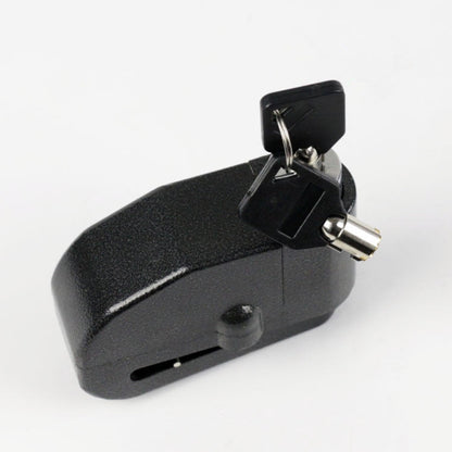 A Motorcycle Alarm Disc Lock with a key attached to it.