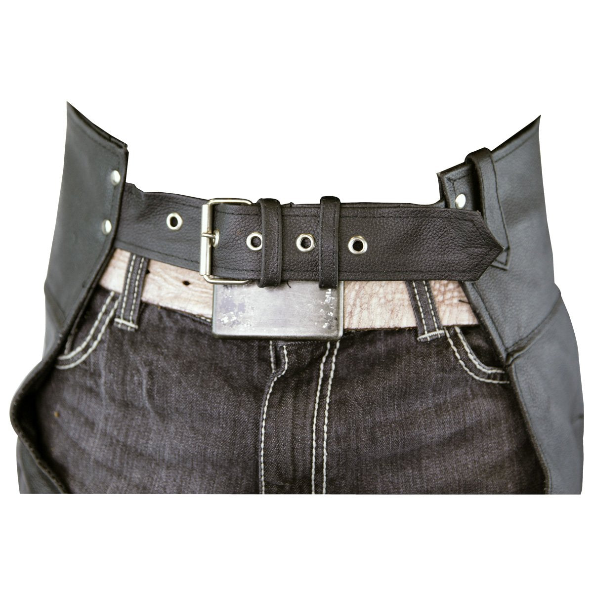A close-up of a person wearing dark jeans with white stitching and a wide black belt with a silver buckle, partially covered by Vance Leather Zip-Out Insulated and Lined Plain Biker Leather Chaps, Unisex.