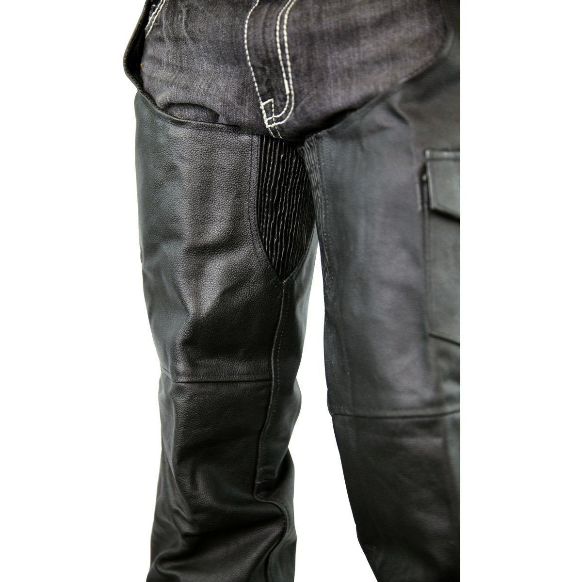 Close-up view of black leather chaps worn over dark jeans, featuring elastic panels and contrast stitching near the hip area, perfect Vance Leather Zip-Out Insulated and Lined Plain Biker Leather Chaps, Unisex for a rugged look.