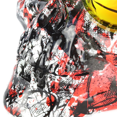 Close-up of a vibrant, abstractly painted sneaker with a glossy finish and a Skull Face Mask with Detachable Goggles design.