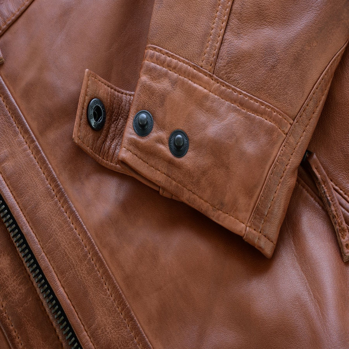 A close up of the Vance Cafe Racer Austin Brown Leather Jacket.
