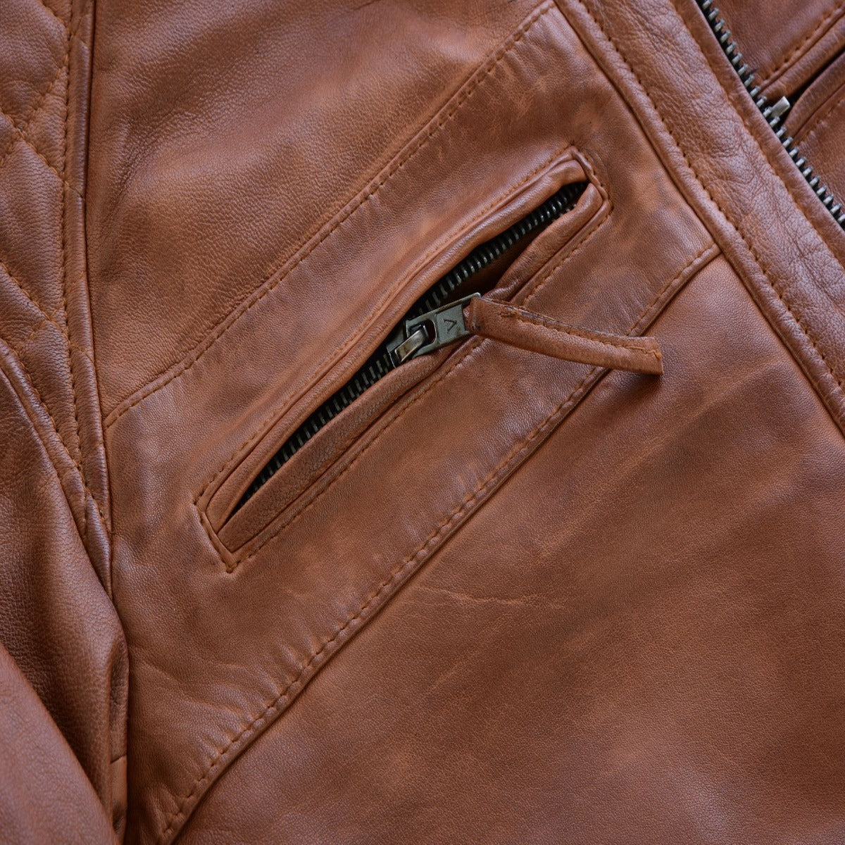 A Vance Cafe Racer Austin Brown Leather Jacket.