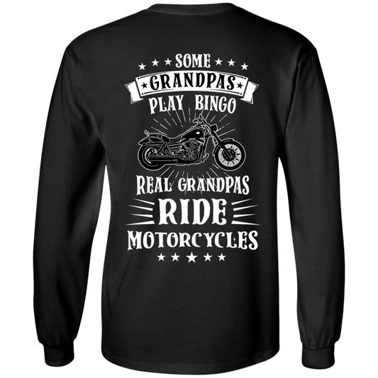 The "Some Grandpas Play Bingo, Real Grandpas Ride Motorcycles" Long Sleeve T-Shirt in black is made from 100% cotton and features the text "Some Grandpas Play Bingo, Real Grandpas Ride Motorcycles" along with a white digital print illustration of a motorcycle on the back. The unisex sizing ensures a comfortable fit for everyone.