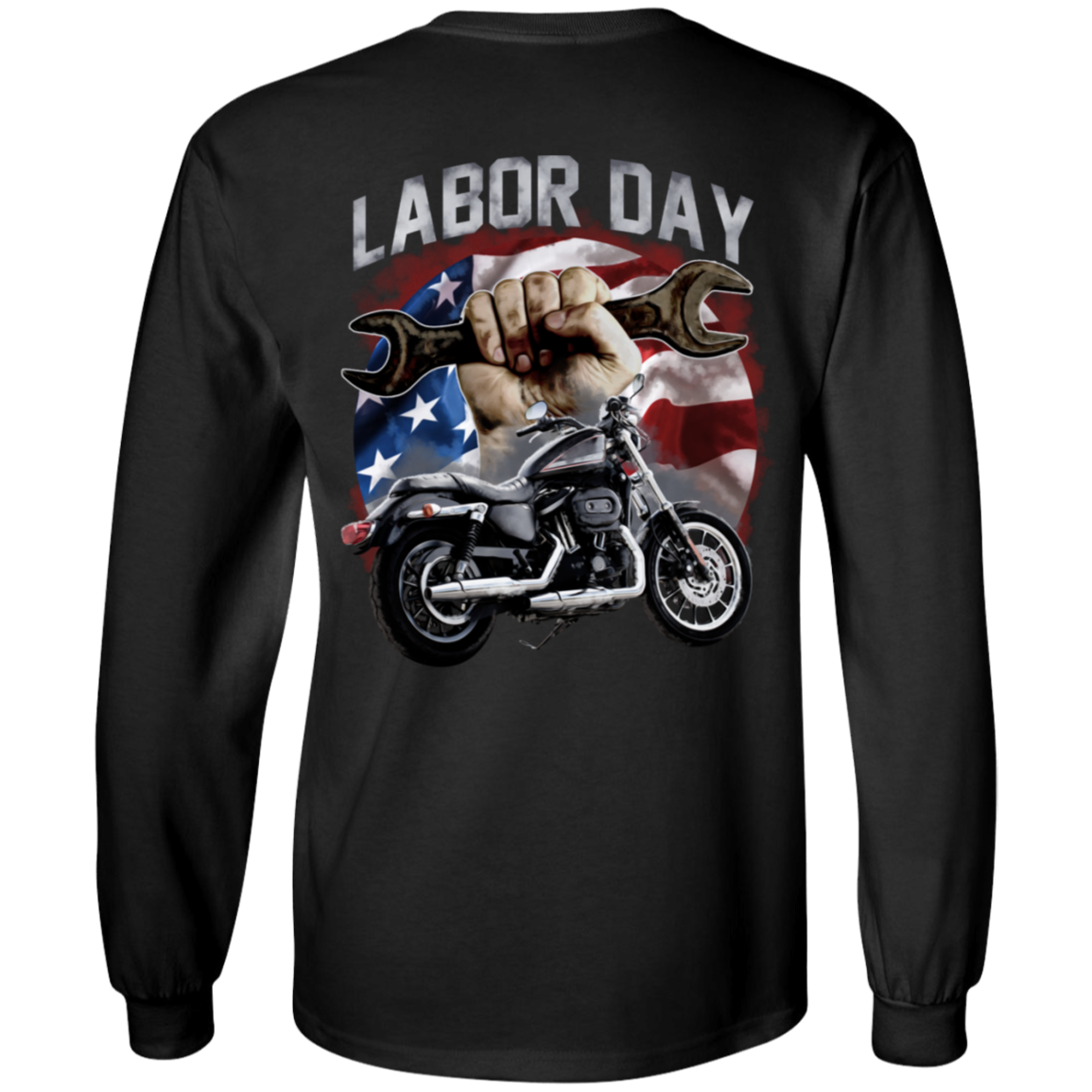 The Labor Day Long Sleeve T-Shirt, designed with a "Labor Day" theme showcasing a hand holding a wrench, an American flag backdrop, and a motorcycle. This unisex shirt offers comfort with its 100% cotton fabric.