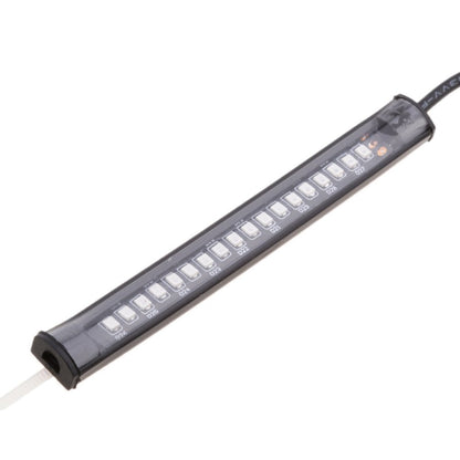 Close-up of a Motorcycle Fork Smoked LED Turn Signal Strip Light from the kit for Harley Davidson 39mm - 41mm Fork, featuring a black casing and connected wire, reminiscent of sleek motorcycle signals.