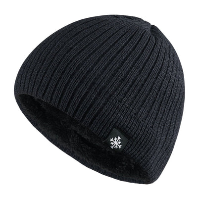 Knitted Winter Beanie Hat with a snowflake on it, made of soft and warm material.