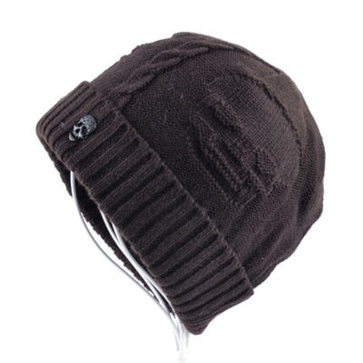 A brown Knitted Skull Pattern Beanie Hat on a white background, providing comfort.