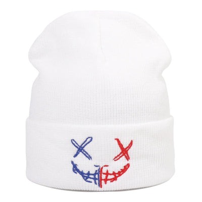 Stay warm and stylish on cold winter days with this Unisex Embroidered Beanie Hat. Made of high-quality materials, it features a white hat with a red, blue, and white Unisex Embroidered Beanie Hat.