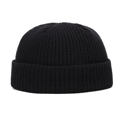 A Wool Knitted Skull Cap Beanie, perfect for winter, against a white background.