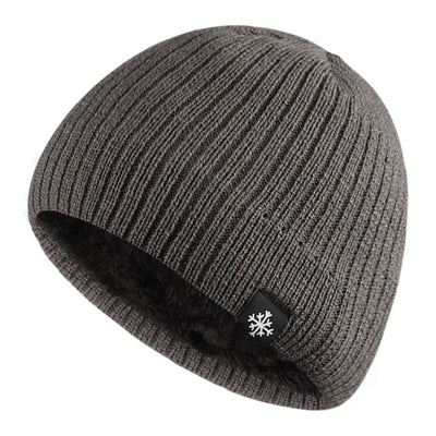 A soft and warm gray Knitted Winter Beanie Hat with a snowflake on it.