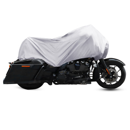 A motorcycle is parked on a white background, safeguarded by the Waterproof Motorcycle Half Cover made from gray 210T polyester fabric, providing excellent protection against the elements.