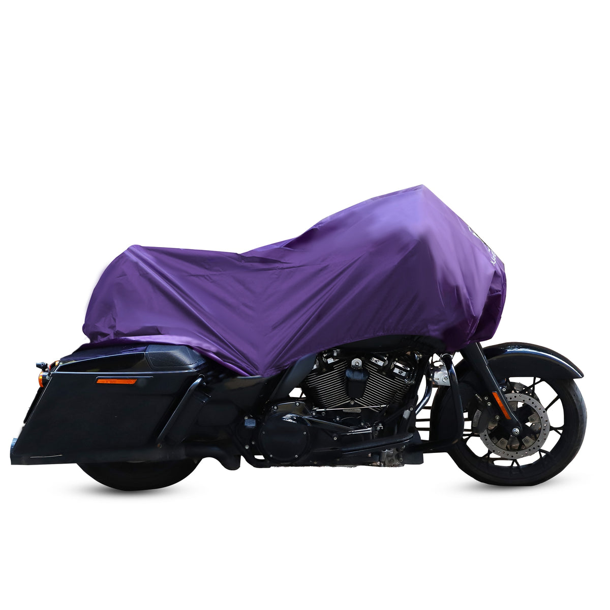 A motorcycle sits beneath the Waterproof Motorcycle Half Cover, providing thorough protection. This cover is crafted from 210T polyester fabric, ensuring durability and security while withstanding the elements.