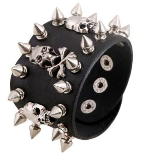 A Skull & Bones Biker Wristbands with skulls and spikes.