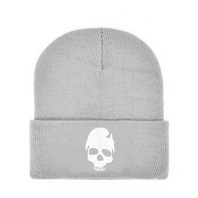 An SEO-optimized Winter Beanie w/ Embroidered Skull Design.