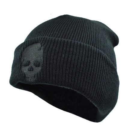 Winter Beanie w/ Embroidered Skull Design: A winter beanie with an embroidered skull design.