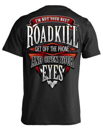 Introducing our new "I'm Not Your Next Roadkill Get Off The Phone And Open Your Eyes" tees - an attractive print on a black t-shirt made with high-quality cotton.