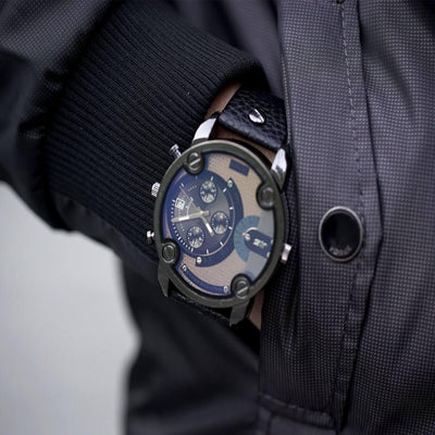 A man's wrist with a Badass Transparent Watch, Stainless Steel Case, Leather Band on it.
