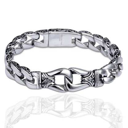 A Stainless Steel Vintage Charm Bracelet for Bikers with intricate detailing and a clasp closure, reminiscent of modern medieval fantasy jewelry, is displayed against a white background.