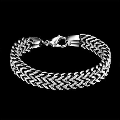 A Stainless Steel Double Side Snake Chain Bracelet with a braided design.