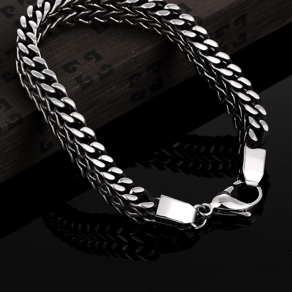 A Stainless Steel Double Side Snake Chain Bracelet on a black background.