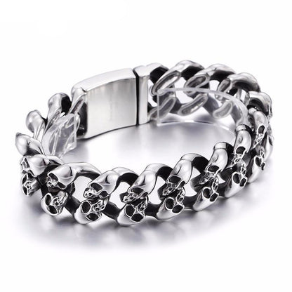 A Stainless Steel Men's Punk Skull Bracelet, Silver with skulls on it.