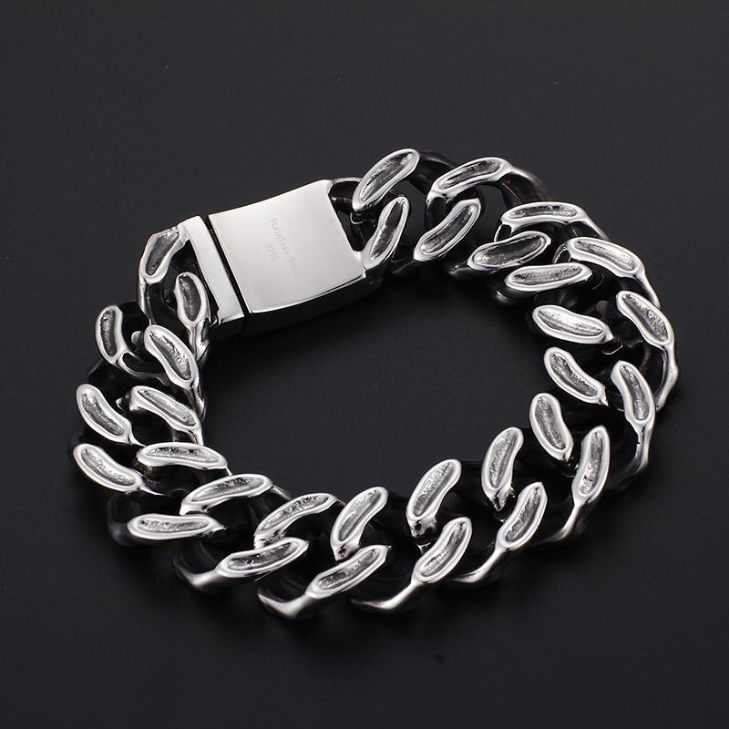 A stylish Stainless Steel Men's Punk Skull Bracelet, Silver with a clasp.
