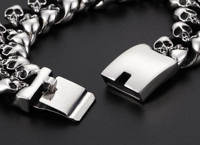 A stylish Stainless Steel Men's Punk Skull Bracelet, Silver adorned with skulls, crafted from stainless steel.