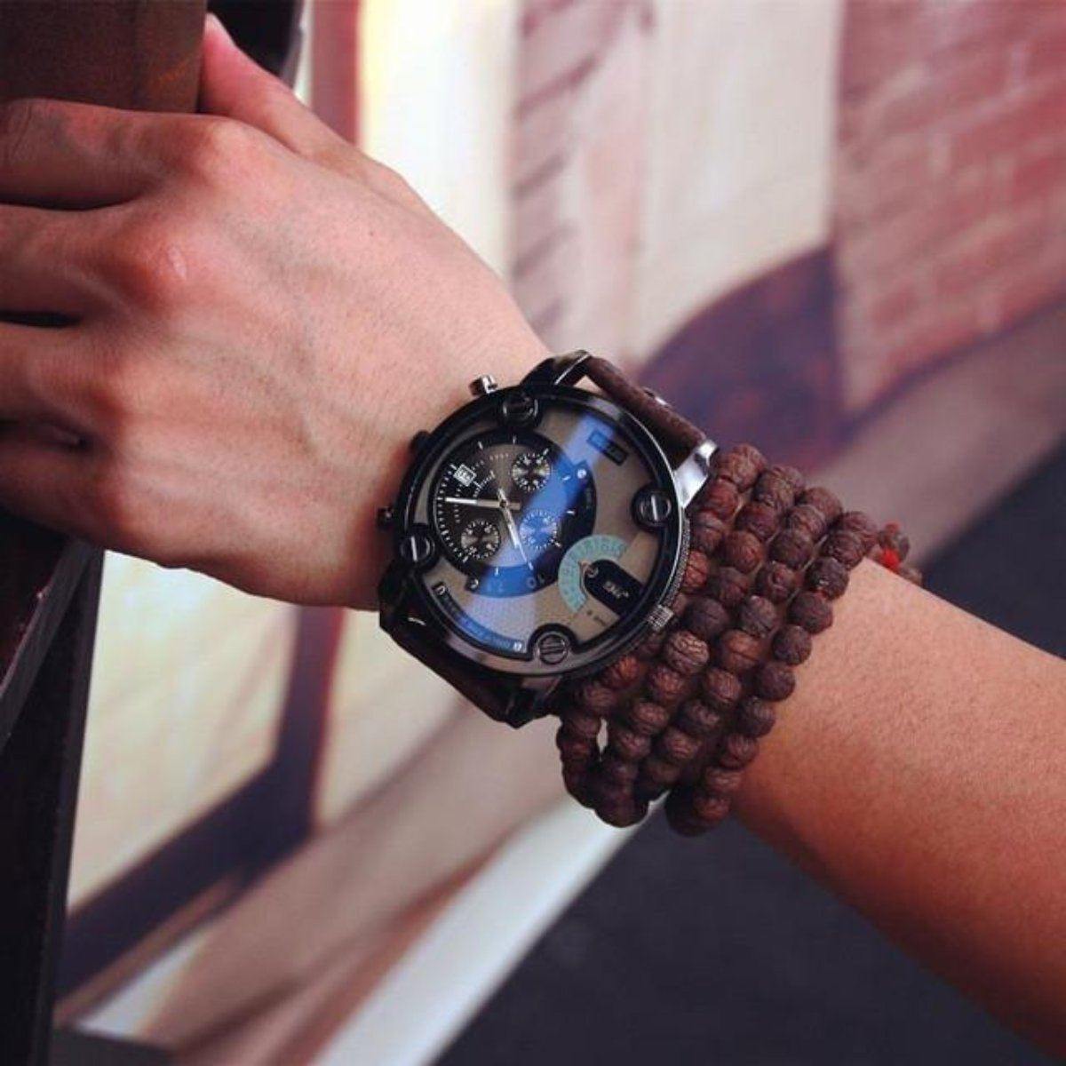 A woman's wrist with a Badass Transparent Watch, Stainless Steel Case, Leather Band on it.