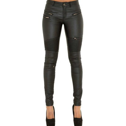 A fashionable woman wearing the Chic Leather Look Bundle: Floral Lace Corset and Sexy Skinny Pants with zippers.