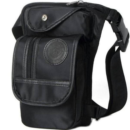 A durable and lightweight canvas image of a black Rider's Rebel Essentials Bundle: Leg Bag, Gloves, and Sunglasses, perfect for the rider's rebel essentials bundle.