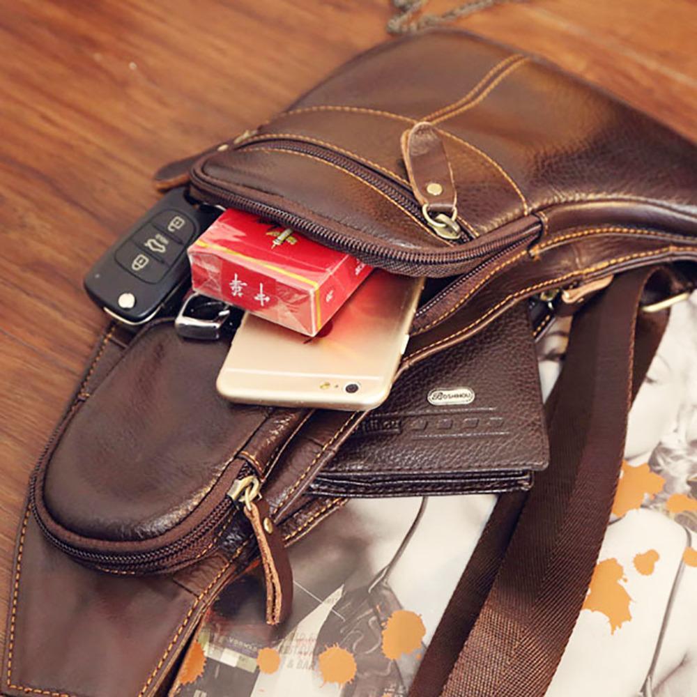 A brown Leather Sling Chest Bag with a cell phone inside. This genuine leather bag features a convenient one-shoulder strap, making it a versatile and stylish leather sling chest bag.