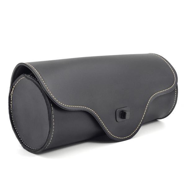 Black skull-shaped round saddle bag for a motorcycle.