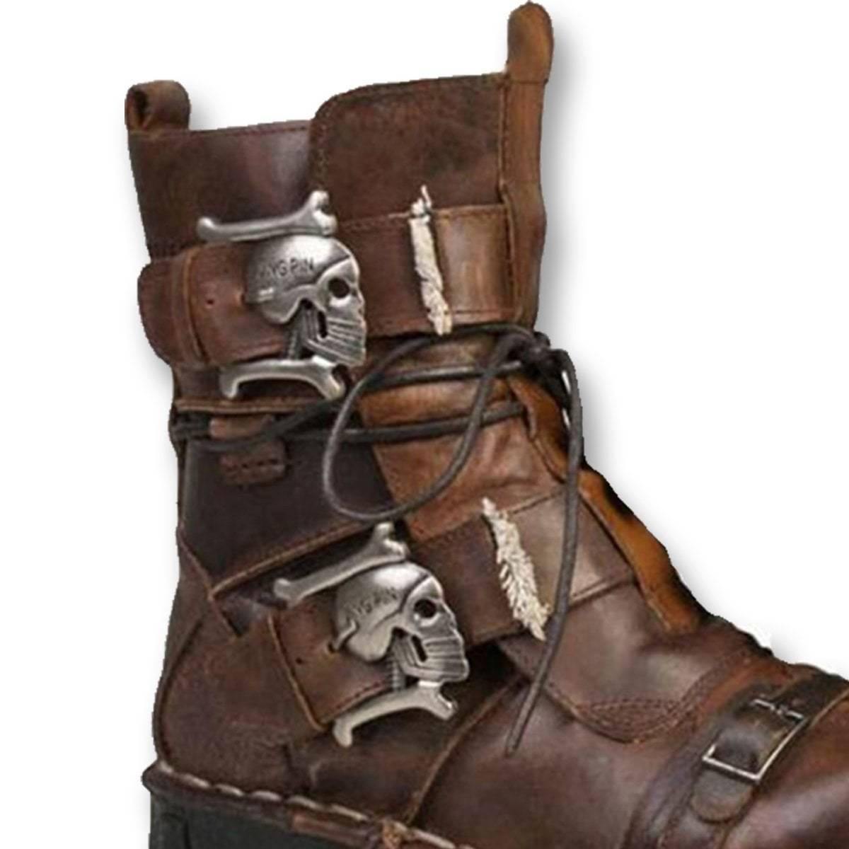 A pair of Handmade Leather Skull Boots with metal buckles and skulls.