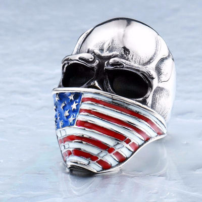 A Stainless Steel Men's American Flag Skull Ring, Silver Color with an american flag on his face.