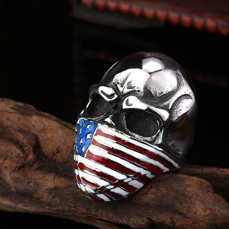 A Stainless Steel Men's American Flag Skull Ring, Silver Color with an american flag on it.