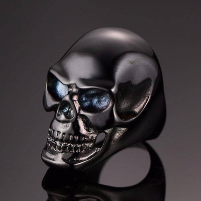A Stainless Steel Premium Skull Biker Ring, Black, with blue eyes, perfect for bikers.