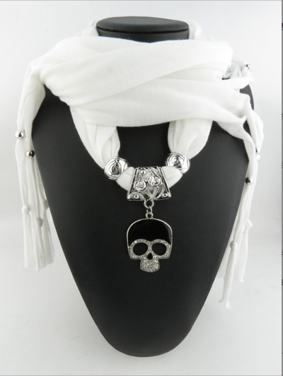 A trendy Fashion Skull Pendant Scarf featuring a skull pendant and tassel.