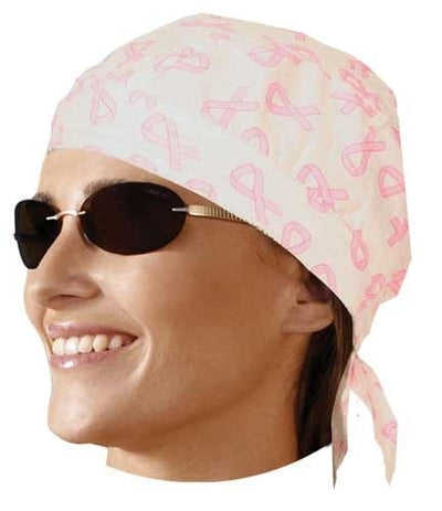 A person wearing the Daniel Smart Headwrap Pink Ribbon, made from 100% cotton for a comfortable custom fit, and sunglasses smiles.