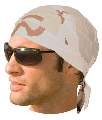 A person is wearing sunglasses and the Daniel Smart Headwrap Camo Three Color Desert, a tan and white bandana made from 100% cotton for a custom fit.