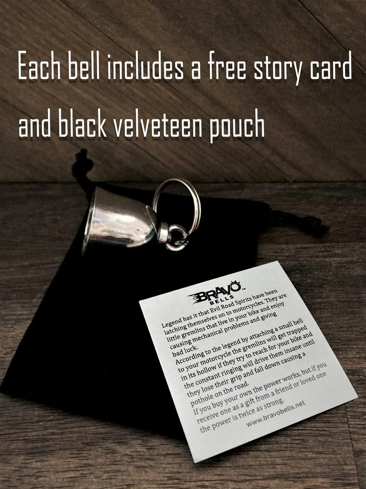 The Daniel Smart Odin Viking God Bell, crafted from lead-free pewter and featuring a keyring, comes with a black velveteen drawstring bag. Included is a Bravo Bells story card. Text above reads: "Each bell includes a free story card and black velveteen pouch.