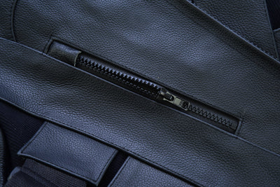 Close-up of a partially unzipped Daniel Smart Men's Updated SWAT Team Style Vest, highlighting the texture and zipper details.