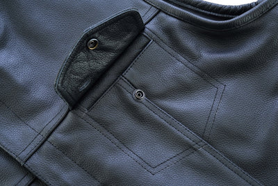 Close-up of a Daniel Smart Concealed Snap Closure, Without Collar & Hidden Zipper showing a front pocket with a snap button and a partially open flap, perfect for biker gear.