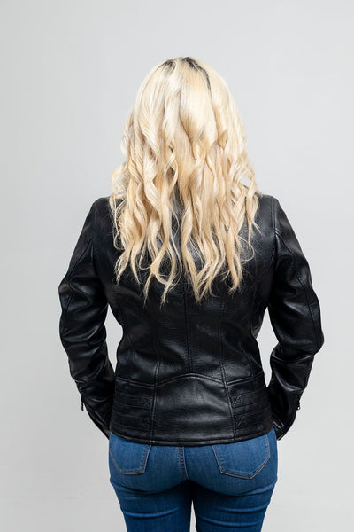A woman sporting a First Manufacturing Lauren - Women's Vegan Leather Jacket, Black with an asymmetrical zipper in the back.